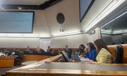 BOS A group of people sitting behind a dais at a government meeting in Santa Clara County, California