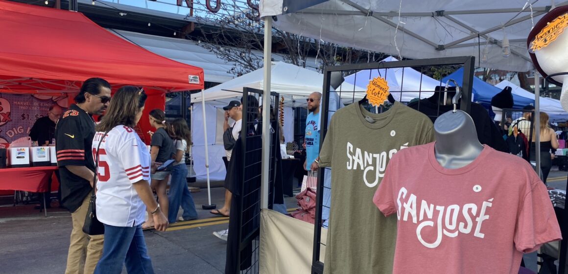 San Jose branded shirts on sale in a vendor market in downtown San Jose.