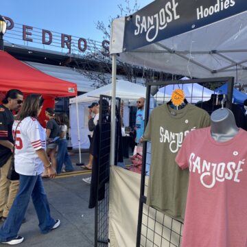 San Jose Merch San Jose branded shirts on sale in a vendor market in downtown San Jose.
