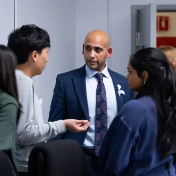 Palo Alto_School-board_62-scaled People talking in a group