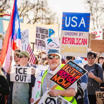 ICE OUT OF THE SUPERBOWL Protesters holding signs in Santa Clara, California