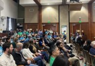 A group of people in chairs at a water board meeting in San Jose, California