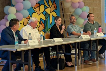 people talking at an event