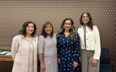 SUPERVISOR SUPER MOMS Four women standing in a line smiling at the viewer