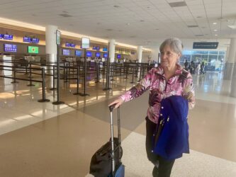 San Jose Mineta International Airport-- JANE WINKLER Elderly lady in San Jose airport