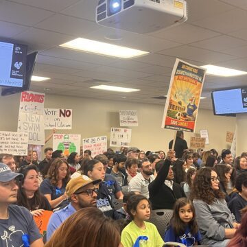 A crowd of people at a school board meeting in San Jose, California