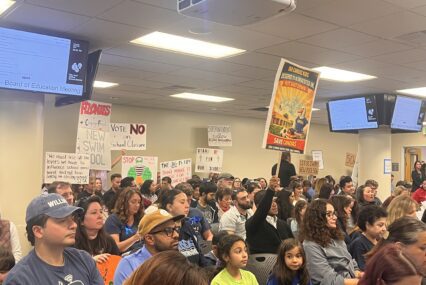 A crowd of people at a school board meeting in San Jose, California
