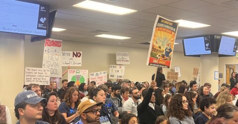 A crowd of people at a school board meeting in San Jose, California