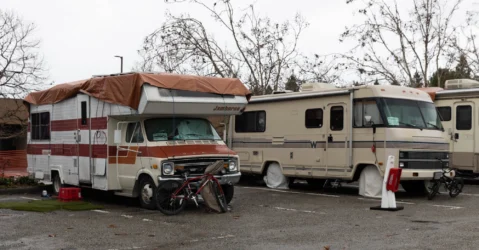 Two RVs parked in a lot in Mountain View, California
