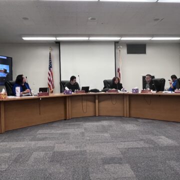 ARUSD AUDIT People sitting at a school board meeting in San Jose, California