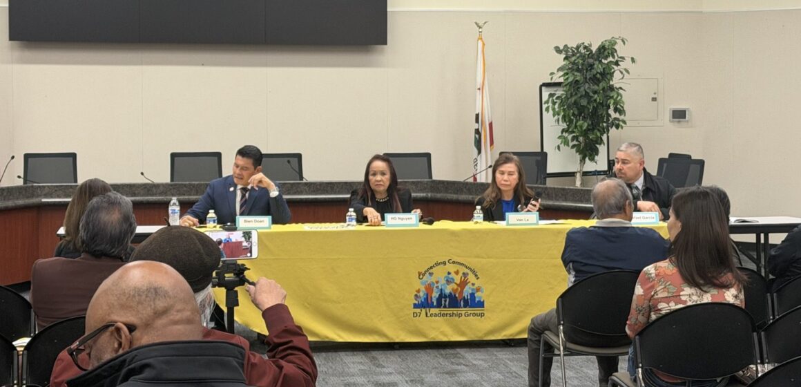 D7 candidate forum Four candidates sitting at a yellow table