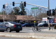Cars and a cyclist at an intersection in Palo Alto, California