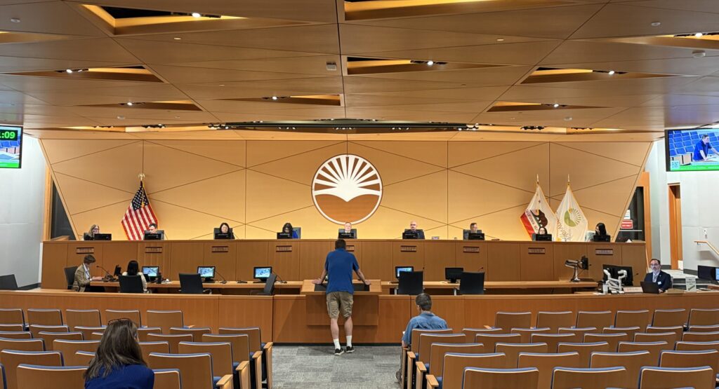 People in the audience of a city council meeting in Sunnyvale, California