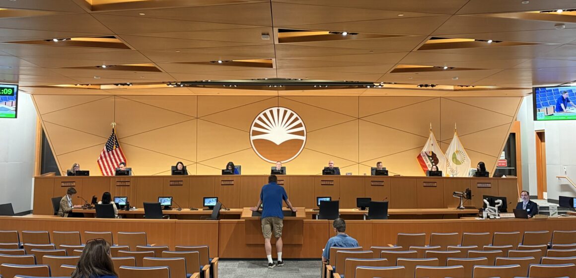 People in the audience of a city council meeting in Sunnyvale, California