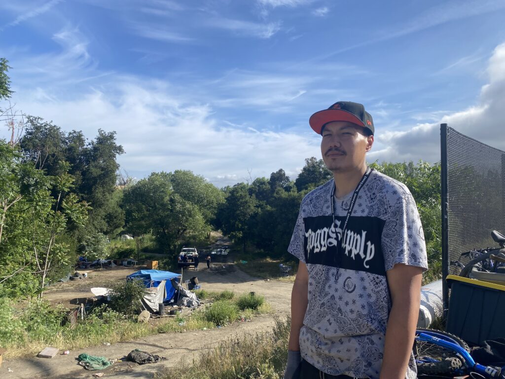 Homeless man at a San Jose encampment