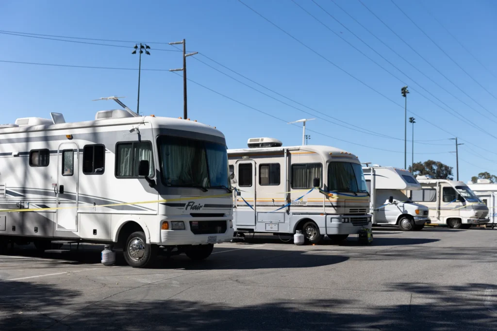 RVs in a parking lot.