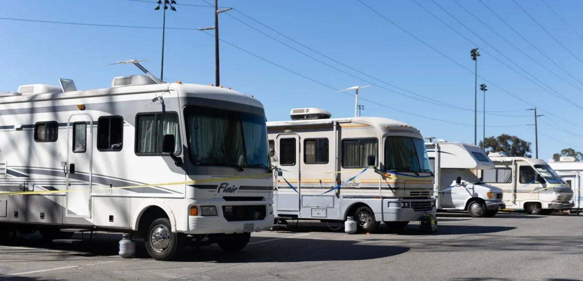 RVs in a parking lot.