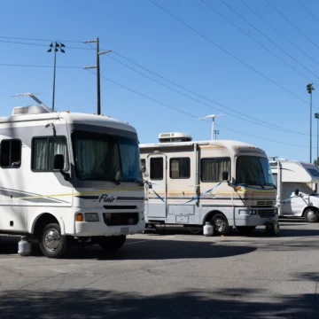 RVs in a parking lot.