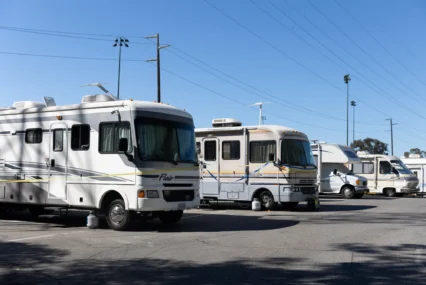 RVs in a parking lot.