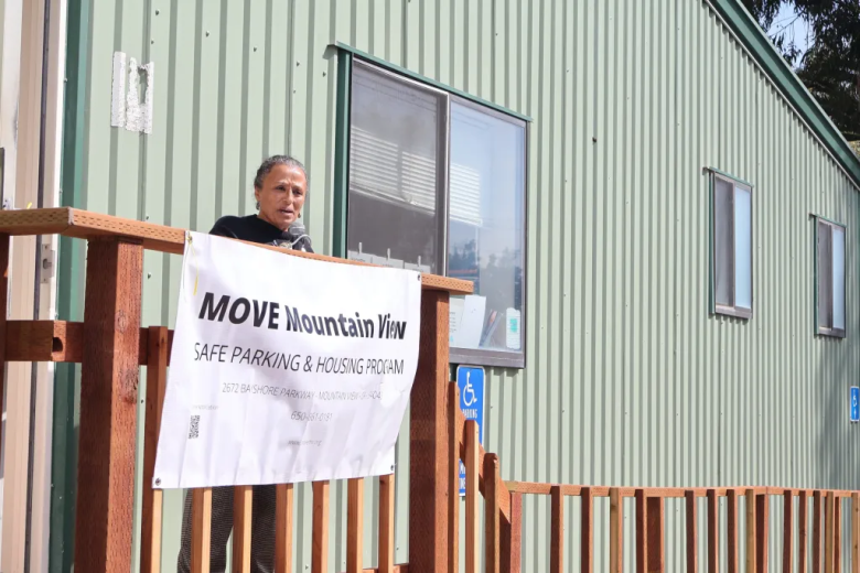Woman standing outside a building