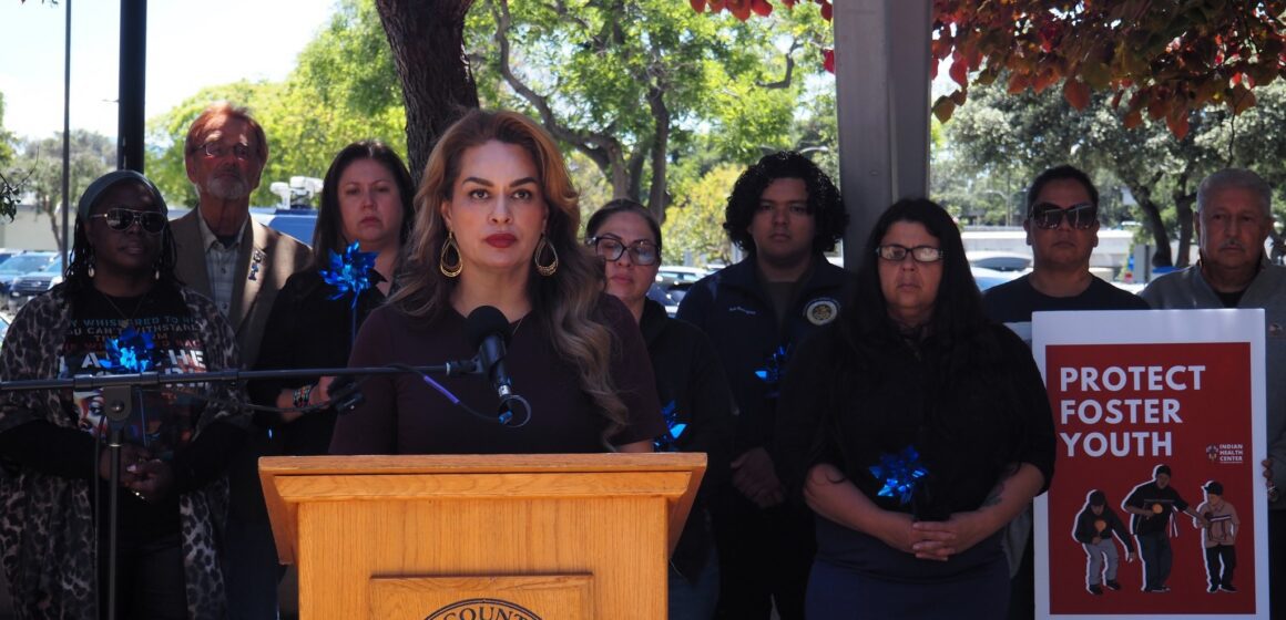 woman standing at podium
