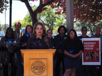 woman standing at podium