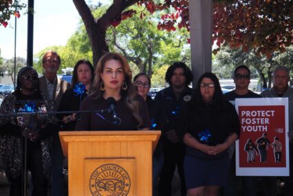 woman standing at podium