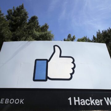 Facebook A sign with a thumbs up emoji