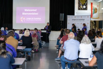 People sitting at tables during a workshop in San Jose, California