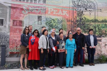 Palo Alto cannery A group of people standing in front of a mural in Palo Alto, California