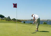 Man playing golf