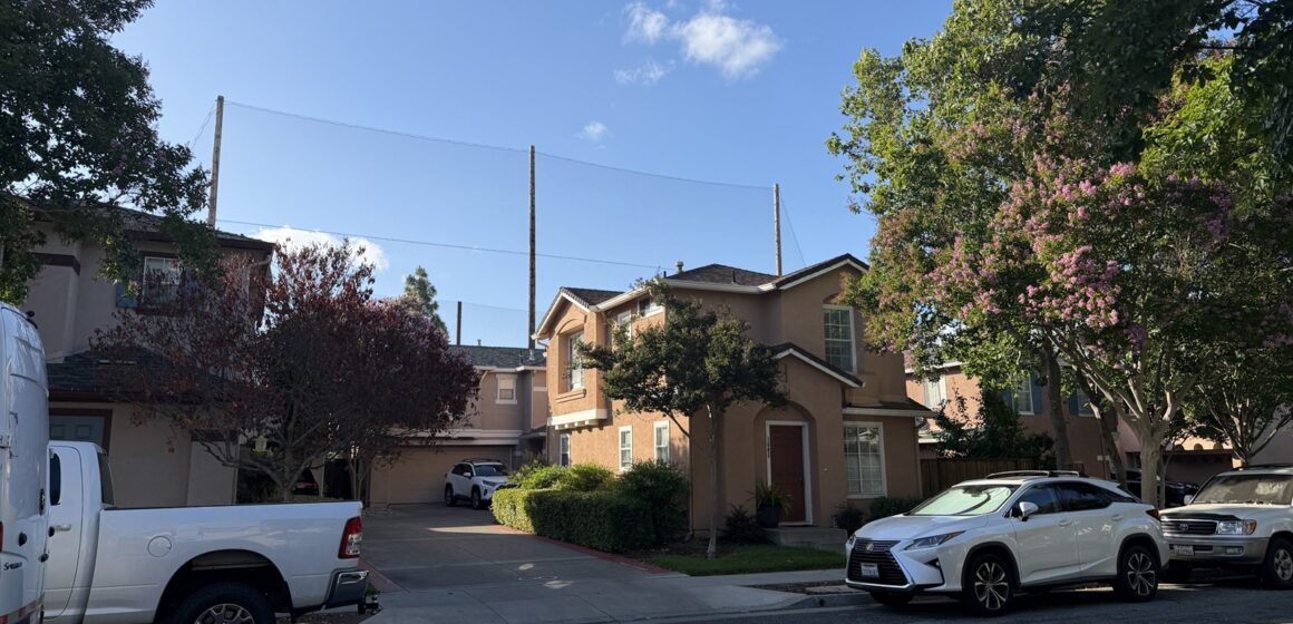 A home stands in front of a large net in San Jose, California
