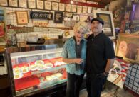 A woman and man standing inside a sandwich shop in San Jose, California