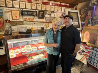 Sourdough Eatery A woman and man standing inside a sandwich shop in San Jose, California