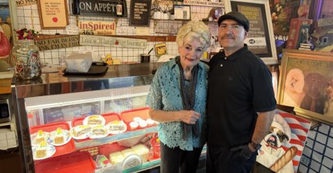 A woman and man standing inside a sandwich shop in San Jose, California