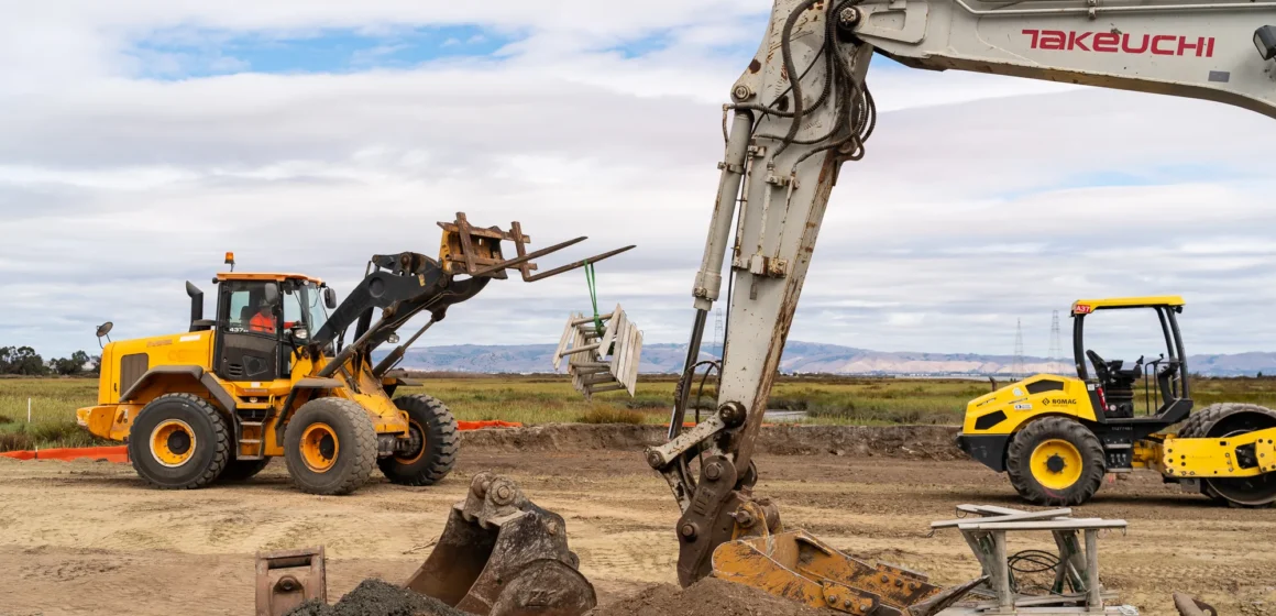 Construction vehicles and equipment on a development site in Palo Alto, California