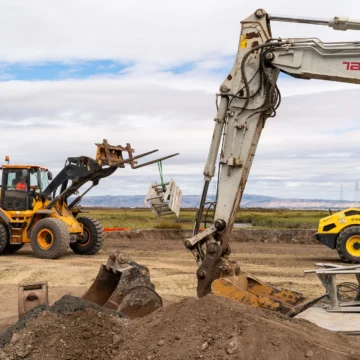Construction vehicles and equipment on a development site in Palo Alto, California