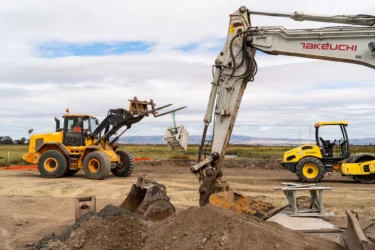 Construction vehicles and equipment on a development site in Palo Alto, California
