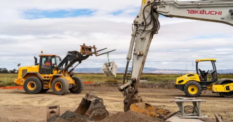 Construction vehicles and equipment on a development site in Palo Alto, California