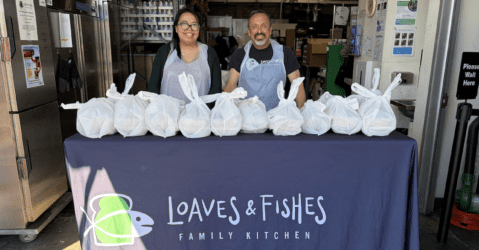 Volunteers serving hot meals