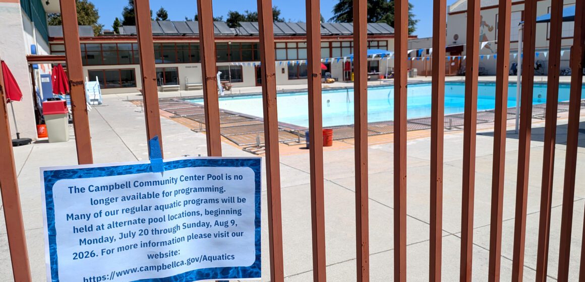 A closed community pool behind a fence in Campbell, California