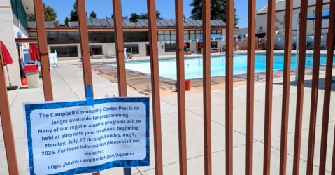 A closed community pool behind a fence in Campbell, California