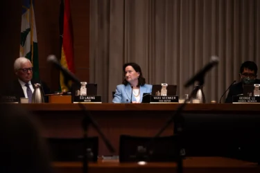 Palo Alto Vicki Veenker Embarcadero A woman sitting behind a dais at a government meeting in Palo Alto, California