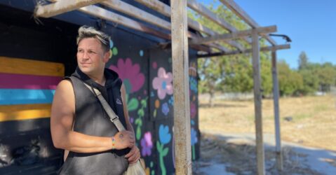 A formerly homeless person standing outside in San Jose, California