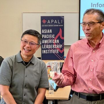 Michael Chang 2 Three Asian men speaking at an event in Santa Clara, California