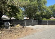 A fence blocking the entrance to a property just outside of Gilroy, California