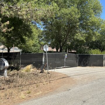 A fence blocking the entrance to a property just outside of Gilroy, California