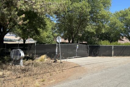 A fence blocking the entrance to a property just outside of Gilroy, California