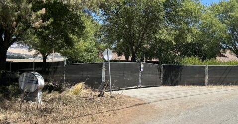 A fence blocking the entrance to a property just outside of Gilroy, California