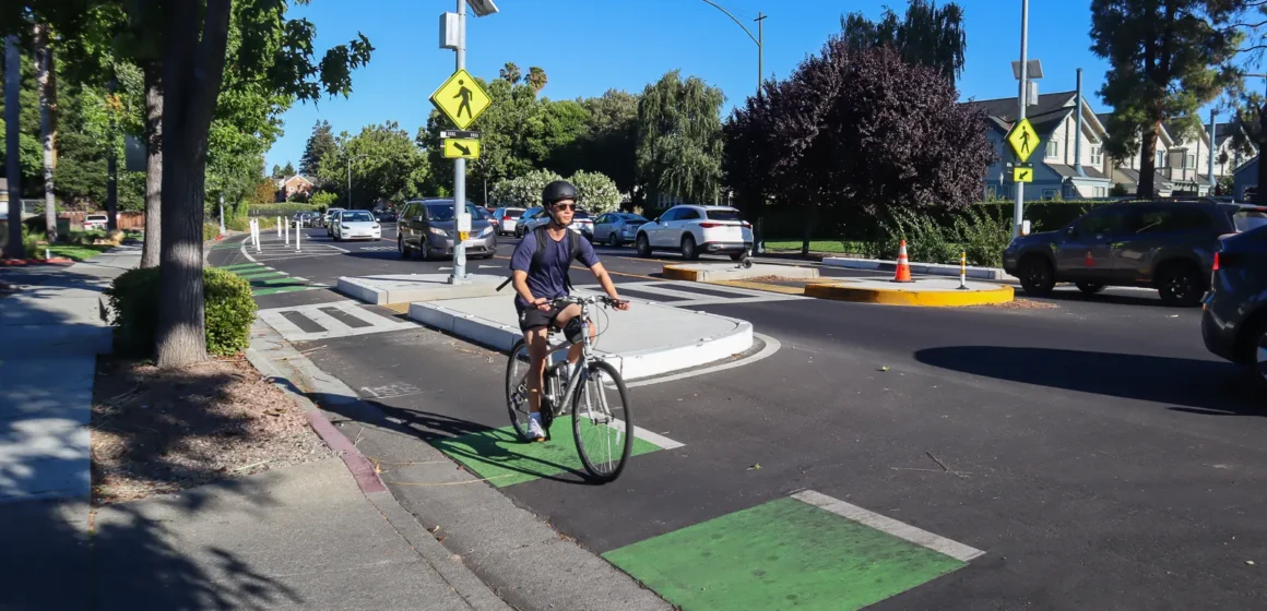 A man on a bicycle in a bike lane in Mountain View, California